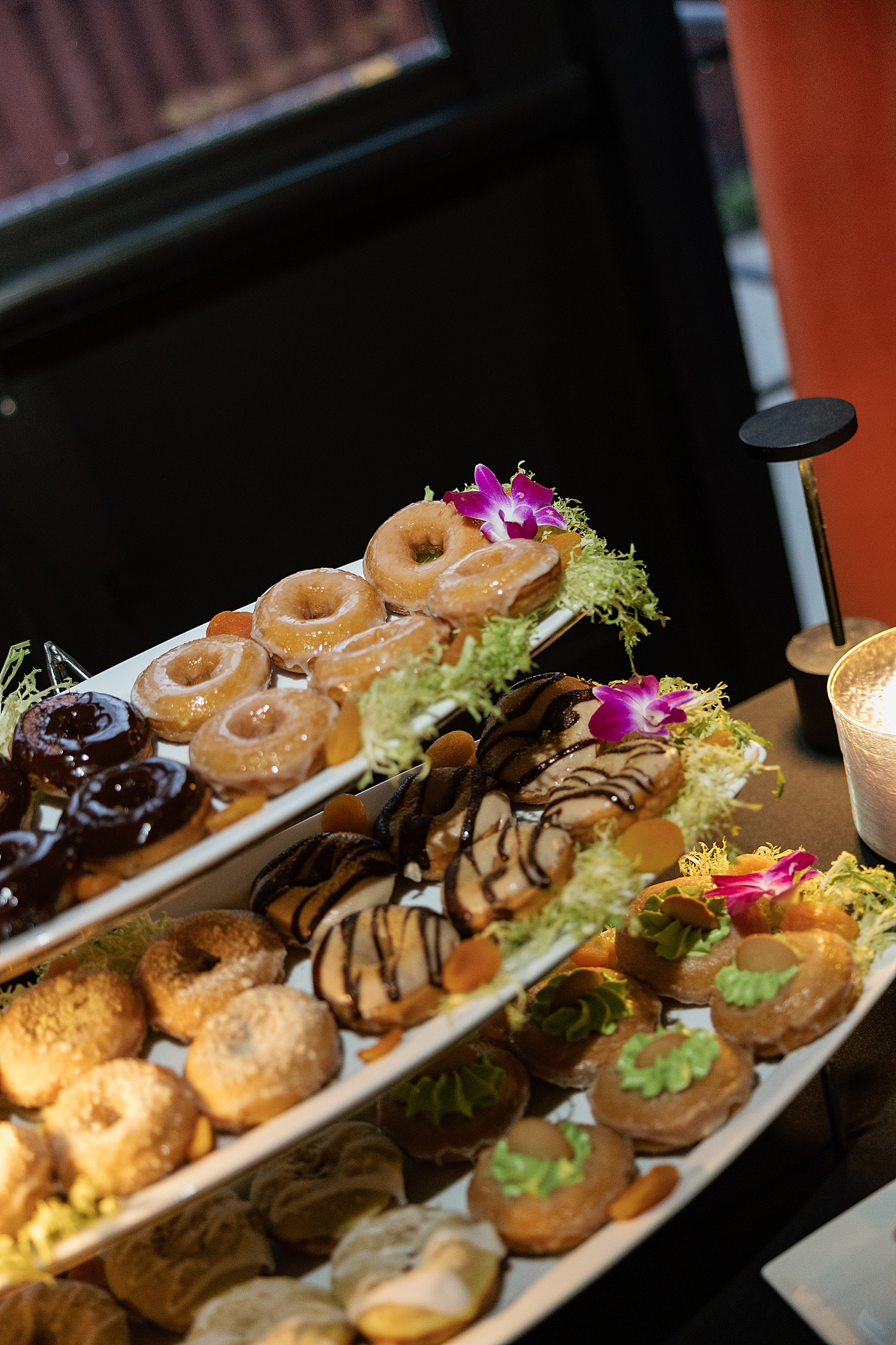 donuts and Lebenese desserts on table by Maryland wedding photographer