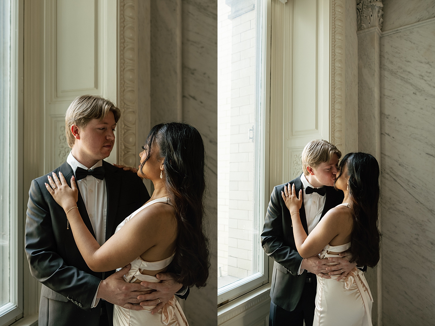 couple snuggle in big window at The Library of Congress
