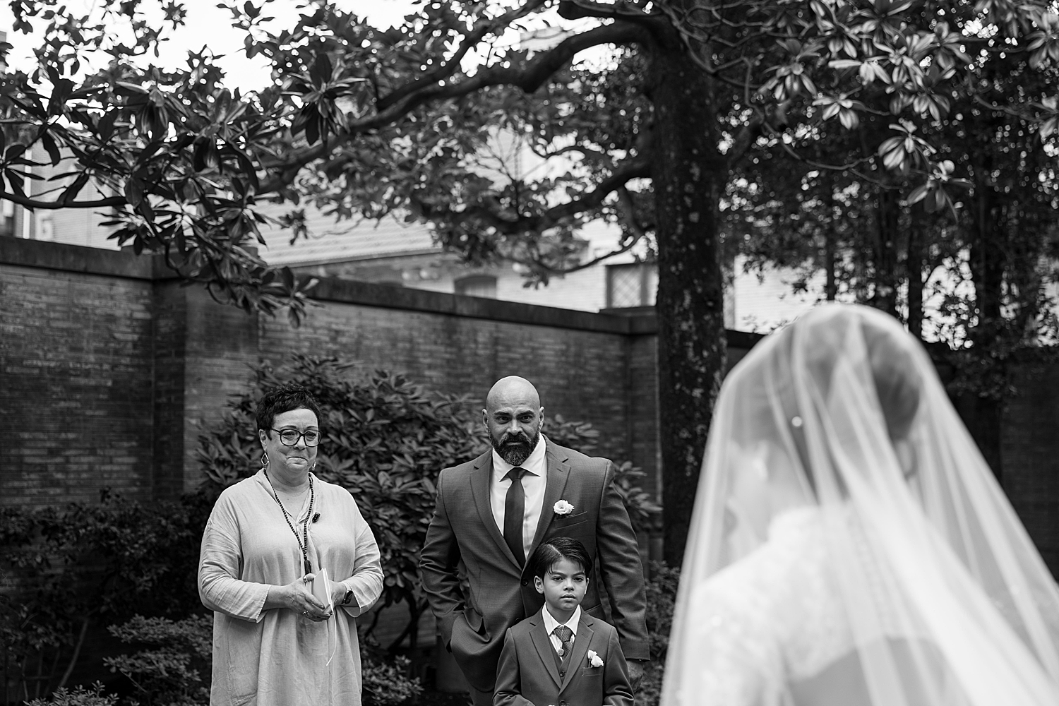 groom tears up watching his bride walk towards him by Sharp Impressions Photography