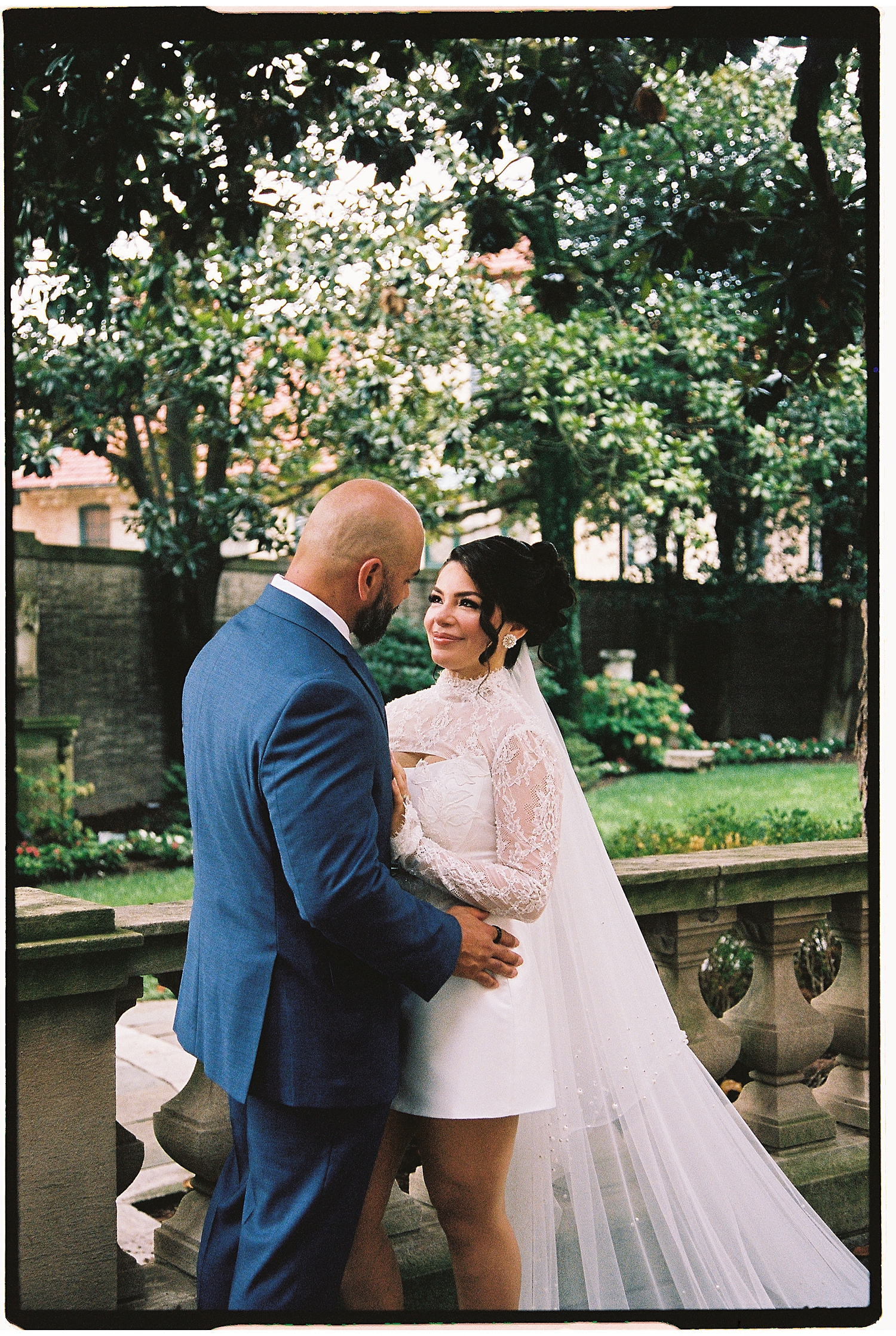 bride and groom huge on terrace for Anderson House Elopement